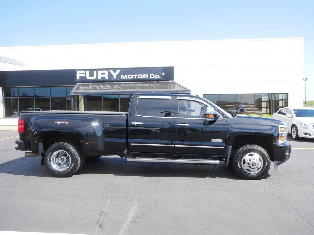 2016 Chevrolet Silverado 3500 HD High Country in Black — front three-quarter view