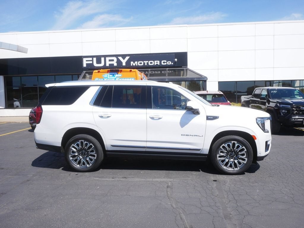 2023 GMC Yukon Denali Ultimate in White Frost Tricoat — front three-quarter view