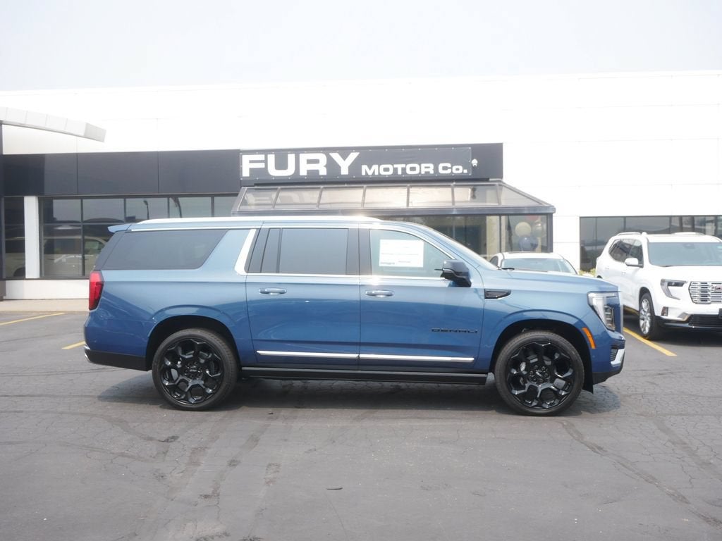 2026 GMC Yukon XL Denali in Downpour Metallic — front three-quarter view