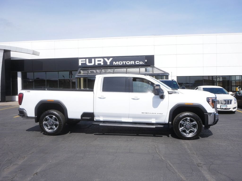 2026 GMC Sierra 3500 HD SLE in Summit White — front three-quarter view