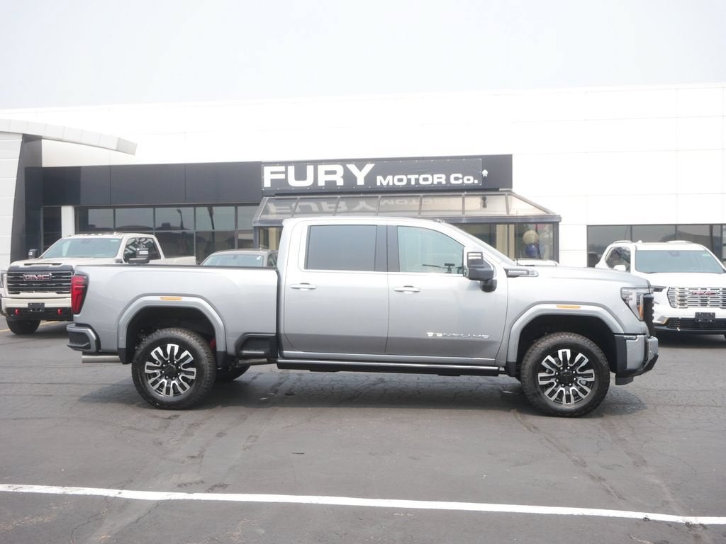 2026 GMC Sierra 3500 HD Denali Ultimate in Sterling Metallic — front three-quarter view