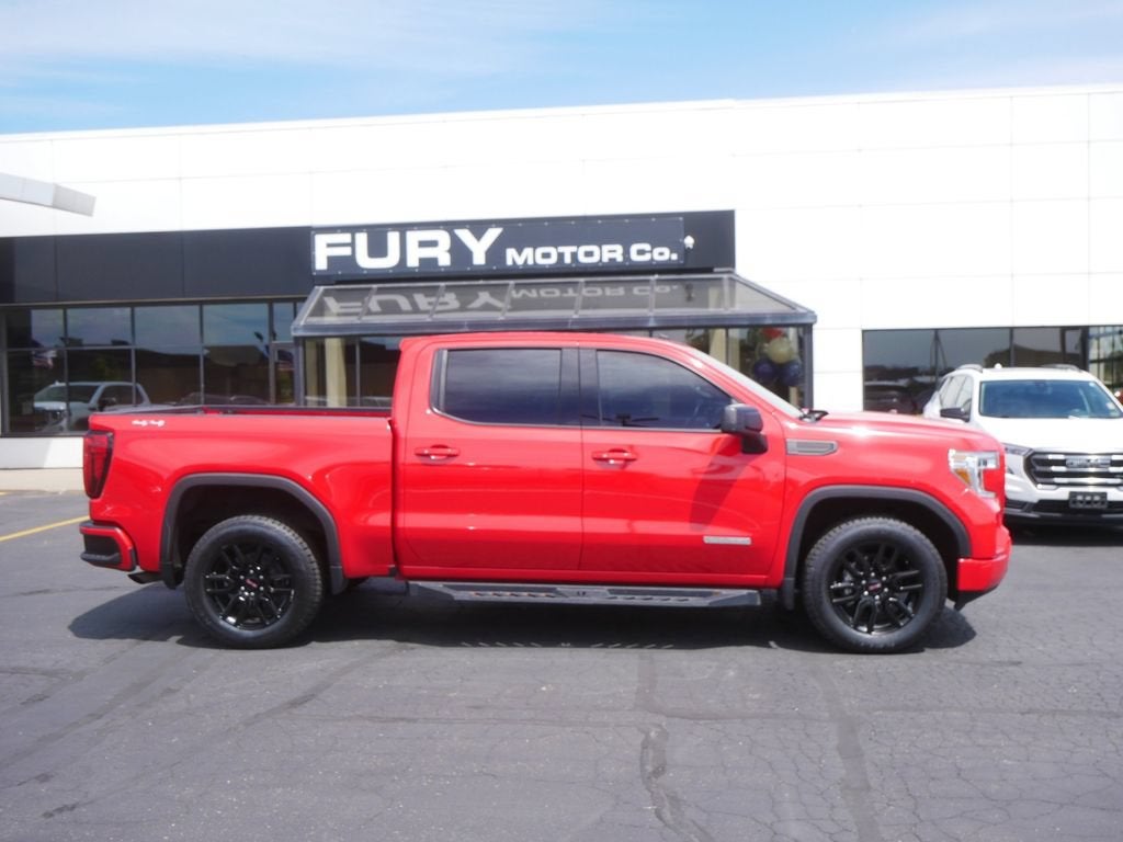 2021 GMC Sierra 1500 Elevation in Cardinal Red — front three-quarter view