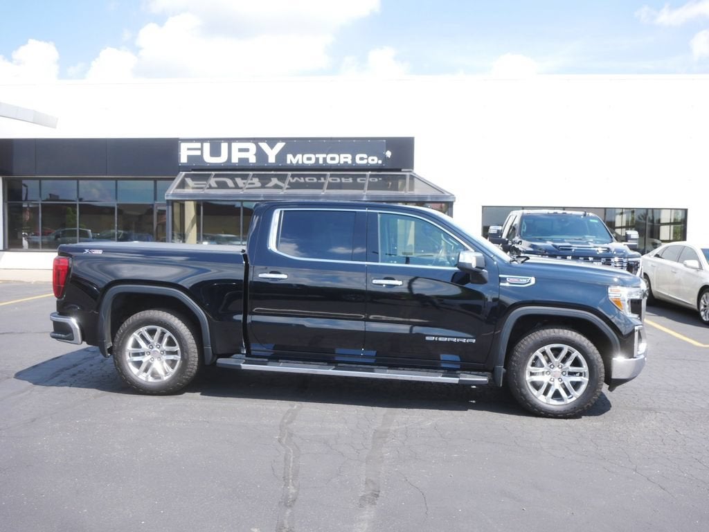 2021 GMC Sierra 1500 SLT in Onyx Black — front three-quarter view