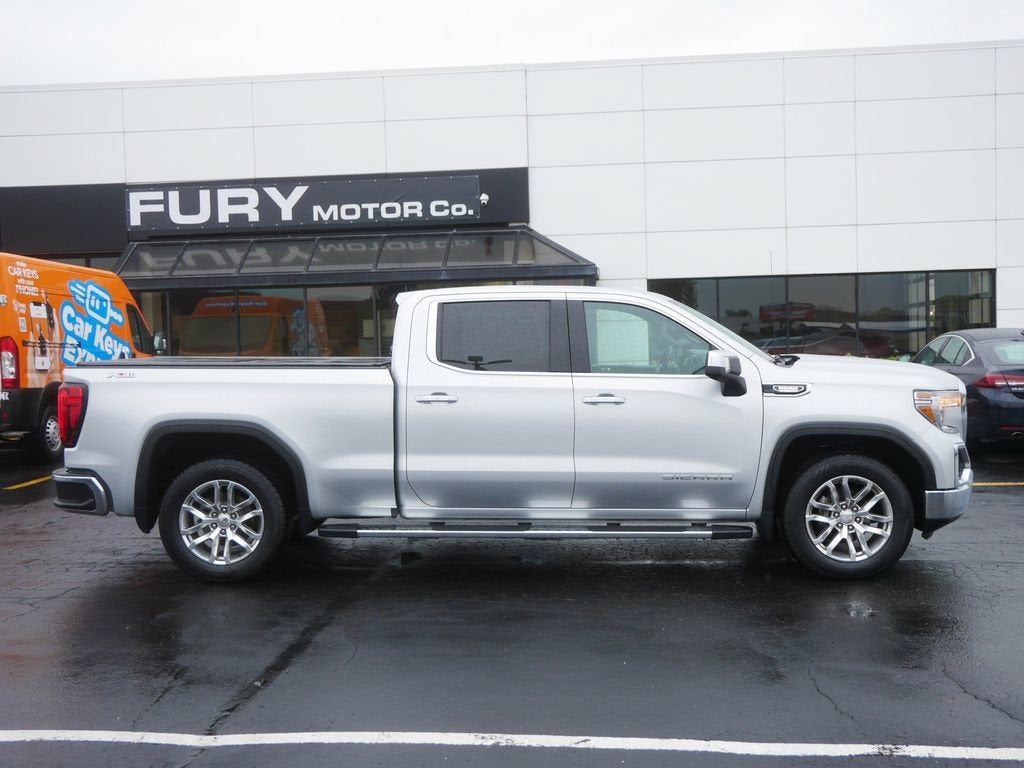 2021 GMC Sierra 1500 SLT in Quicksilver Metallic — front three-quarter view