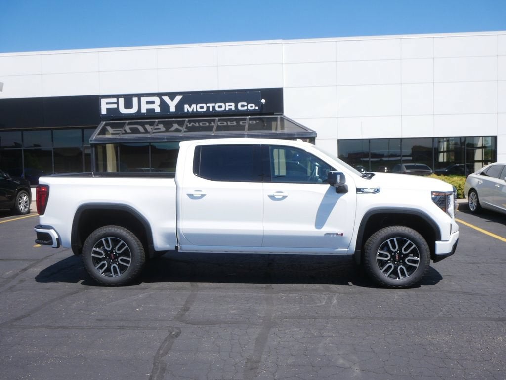 2026 GMC Sierra 1500 AT4 in Summit White — front three-quarter view